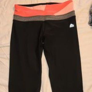 RBX size medium. Mid-rise and sits below the knee.